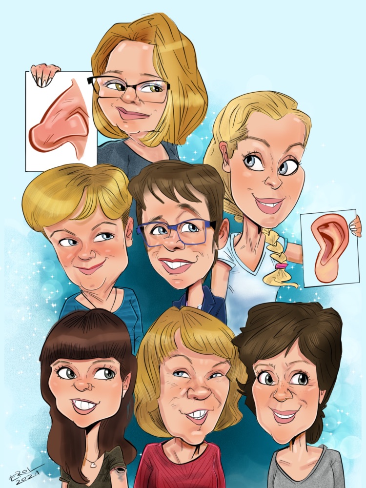 Teambild HNO-Praxis – Mitarbeiterinnen mit medizinischen Bildtafeln