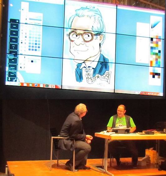 Jubiläumsgäste beim Schnellzeichner an der Staffelei lachend